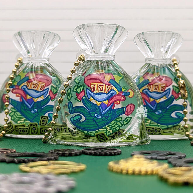 Acrylic shaker charm filled with oil and sequins. Designs based on Toontown: Corporate Clash.