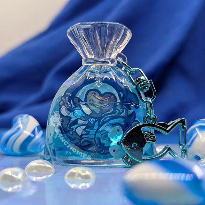 Acrylic shaker charm filled with oil and sequins. Designs based on Warframe.